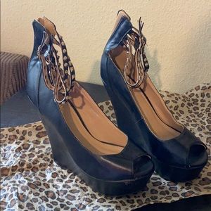 Black wedges with studded straps barely used.